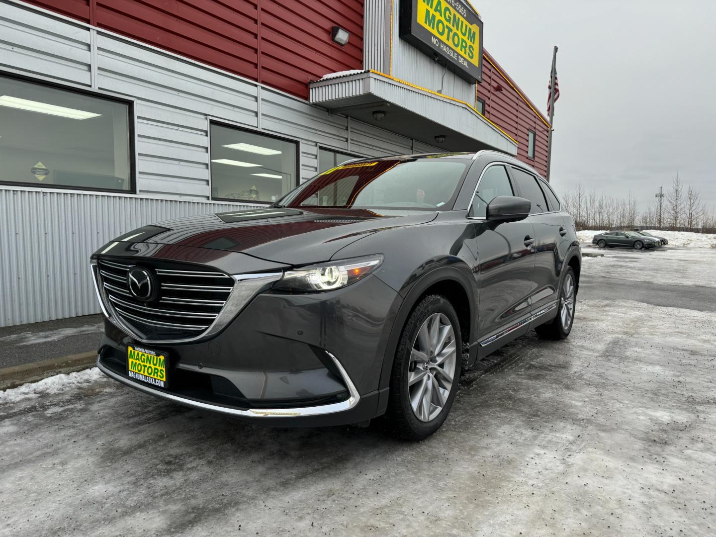 2021 Gray /Black Mazda CX-9 Grand Touring AWD (JM3TCBDY5M0) with an 2.5L L4 DOHC 16V engine, 6A transmission, located at 1960 Industrial Drive, Wasilla, 99654, (907) 274-2277, 61.573475, -149.400146 - Photo#0